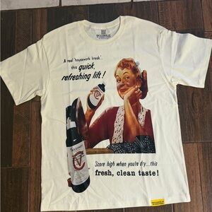 Vintage-Style White Graphic Tee with Retro Ad Print